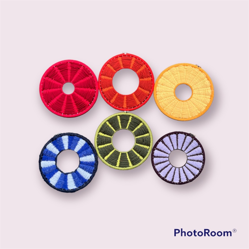 Handmade 10” circular rainbow wall hangings